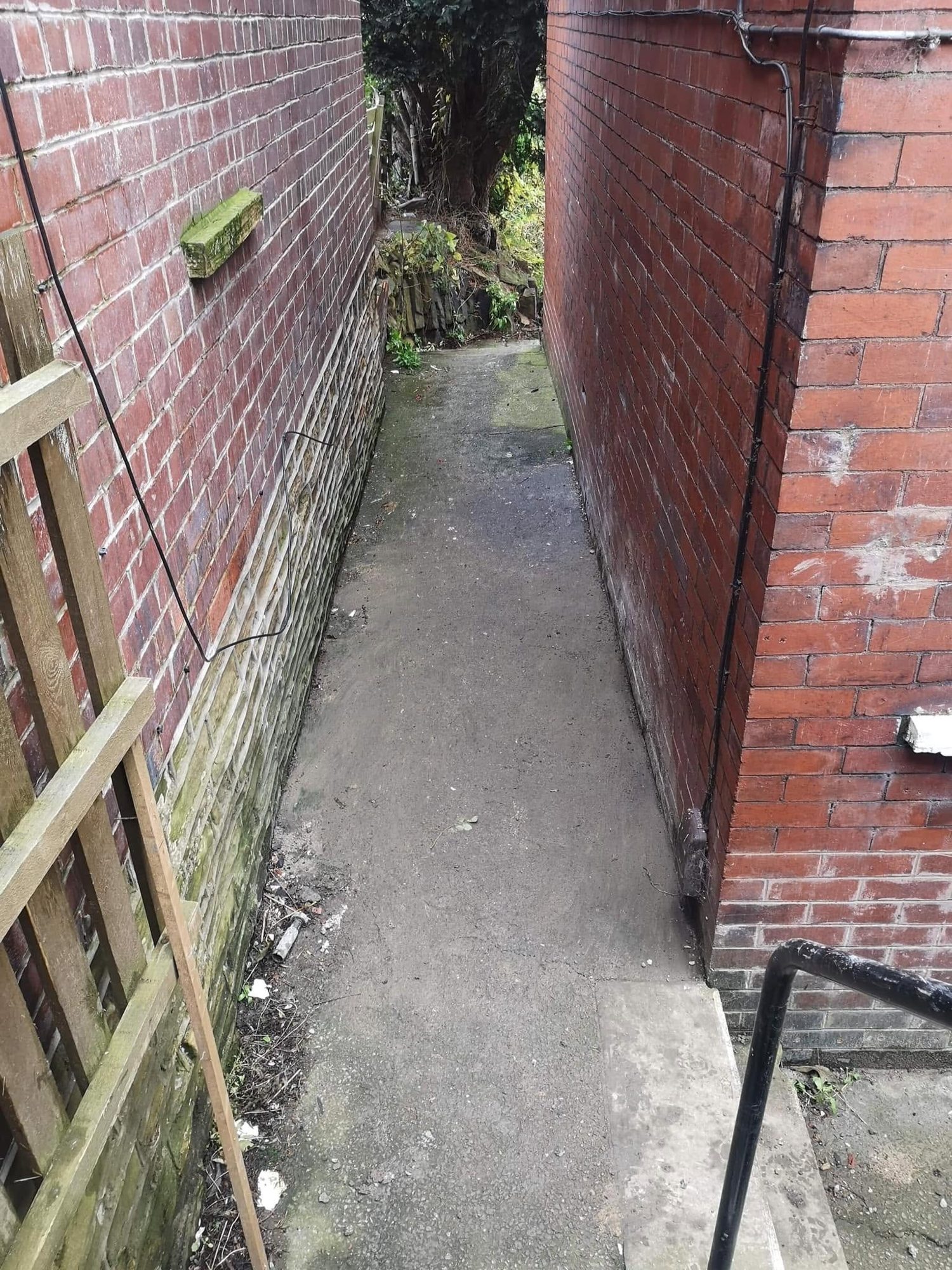 Empty narrow brick passage