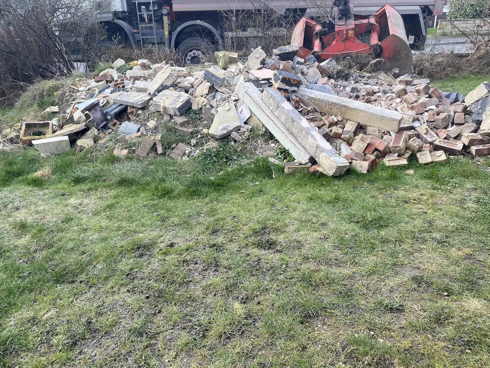 Pile of bricks and renovation rubble awaiting trade waste removal