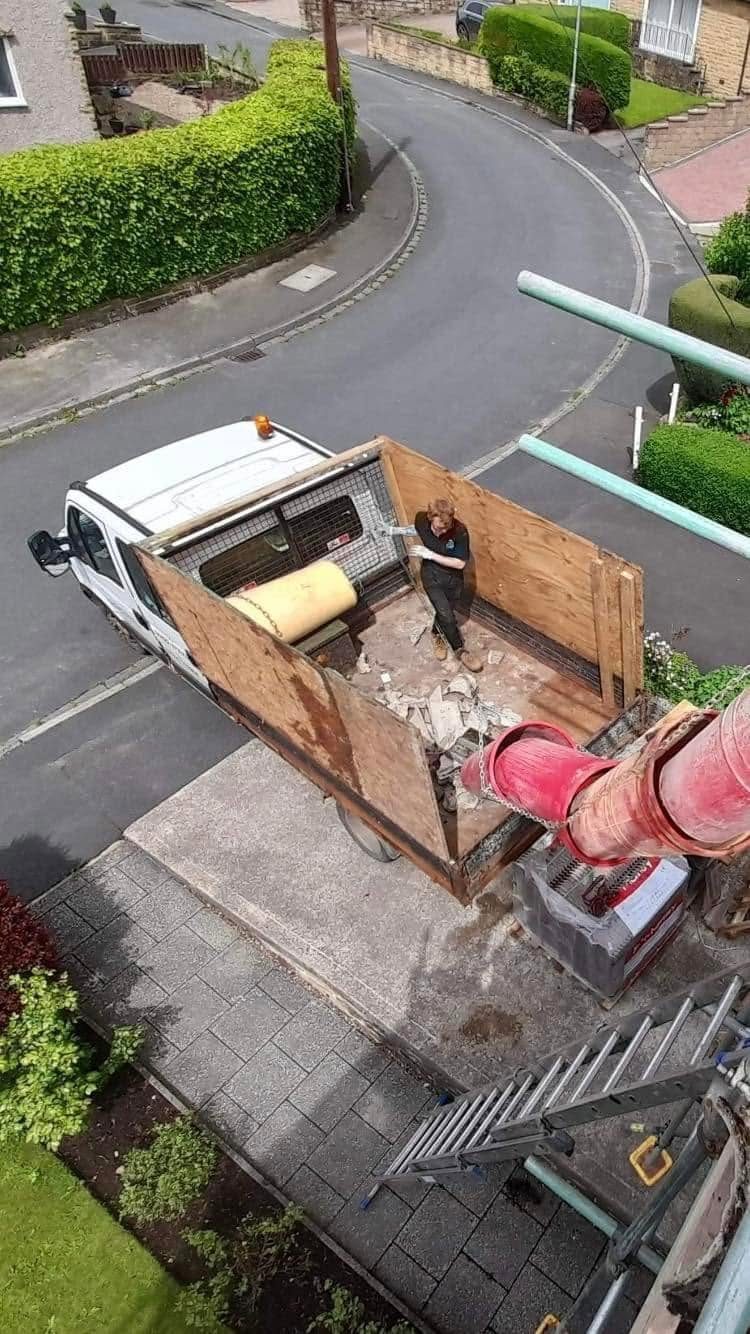 Overhead distant view of truck being loaded