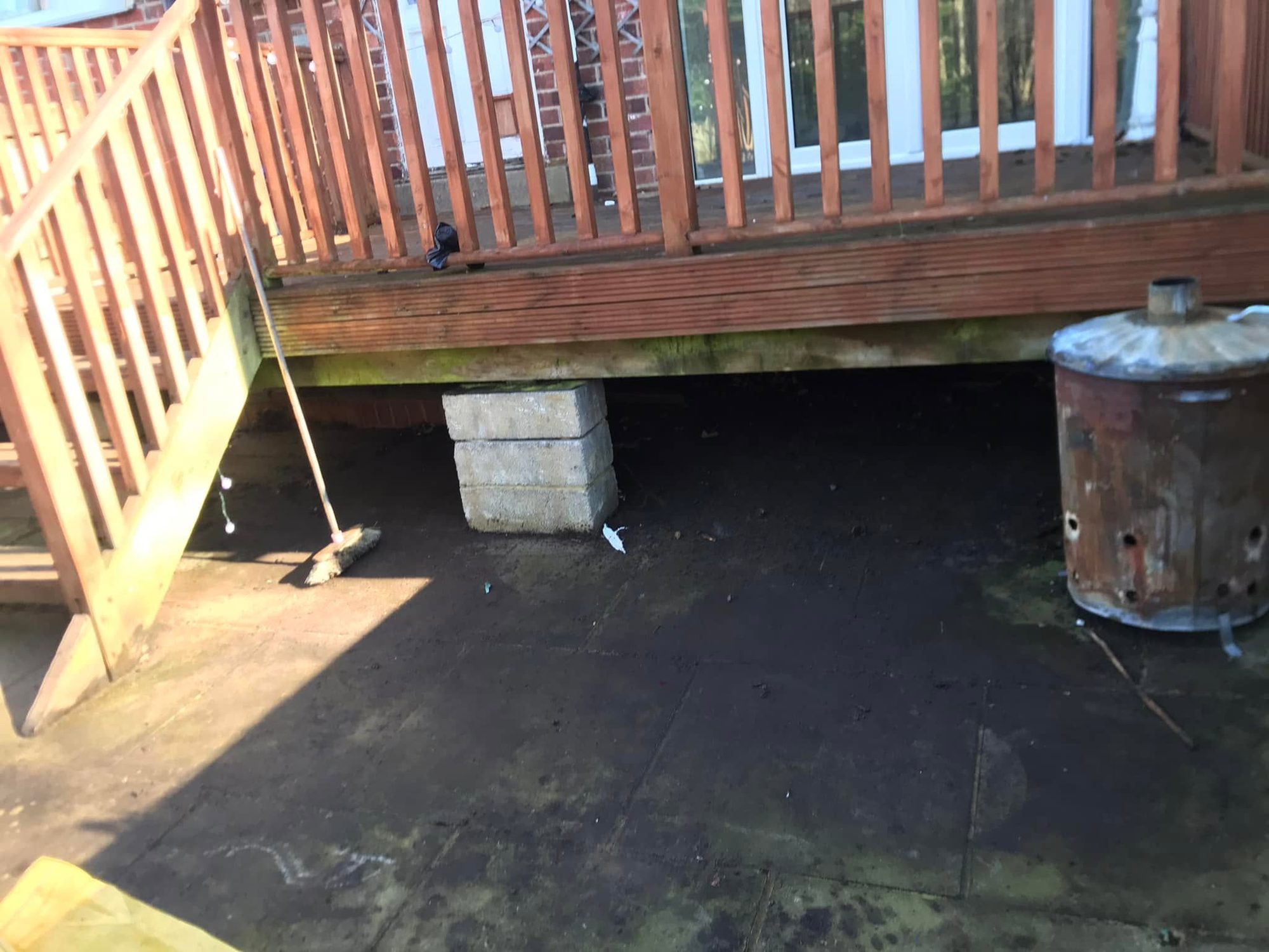 Shadowed area beneath timber decking